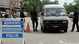 malaysia-police-migrant.png