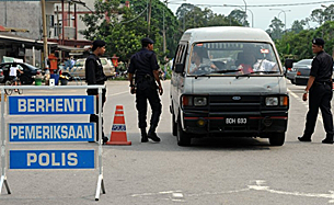 malaysia-police-migrant.png malaysia-police-migrant.png