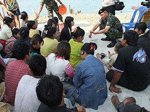 migrant_arrested_305px.jpg migrant_arrested_305px.jpg