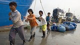 migrant_labor_fishing_boat_305px.jpg