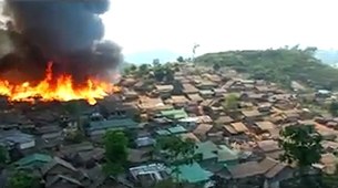 refugee-camp-fire-b305 refugee-camp-fire-b305