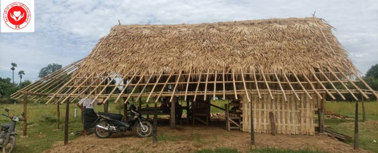 မီးရှီု့ ဖျက်ဆီးခံရမှုကြောင့် နေစရာအခက်အခဲ ရှိနေသူများအား S&C  မီးဘေး စစ်ဘေး ပညာရေး ကူညီစောင့်ရှောက်ရေးအဖွဲ့မှ ပြန်လည်ဆောက်လုပ်ပေးထားသည့် အိမ်တစ်လုံးကို ၂၀၂၃ ခုနှစ်၊ ဇူလိုင်လ ၉ ရက်နေ့က တွေ့ရစဉ်။ (ဓာတ်ပုံ -  S&C  မီးဘေး စစ်ဘေး ပညာရေး ကူညီစောင့်ရှောက်ရေးအဖွဲ့)