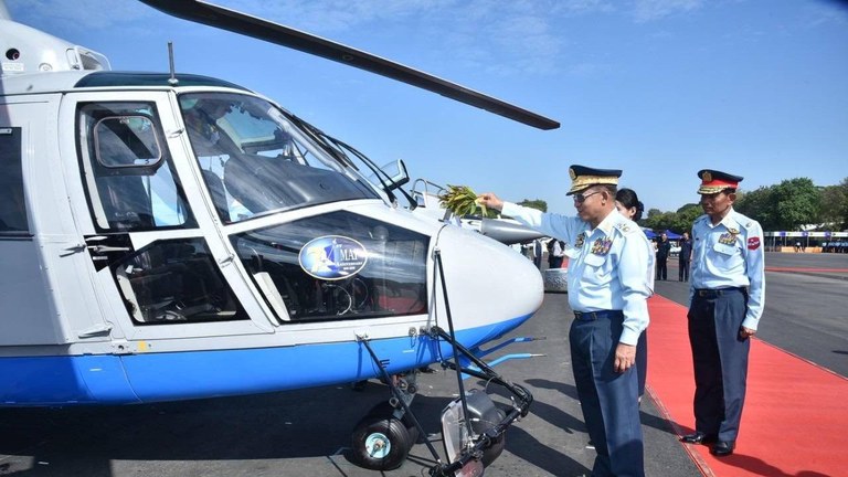 မိတ္ထီလာ လေကြောင်းအတတ်သင် လေတပ်စခန်းဌာနချုပ်တွင် ပြုလုပ်ခဲ့သည့် စစ်ကောင်စီ၏ (၇၁) နှစ်ပြည့် လေတပ်အခမ်းအနားတွင် Eurocopter 365 အမျိုးအစား ရဟတ်ယာဉ်တစ်စင်း တပ်တော်ဝင်နေပုံကို ၂၀၁၈ ခုနှစ် ဒီဇင်ဘာလ ၁၅ ရက်နေ့က တွေ့ရစဥ်။ (Photo: Myanmar Military)