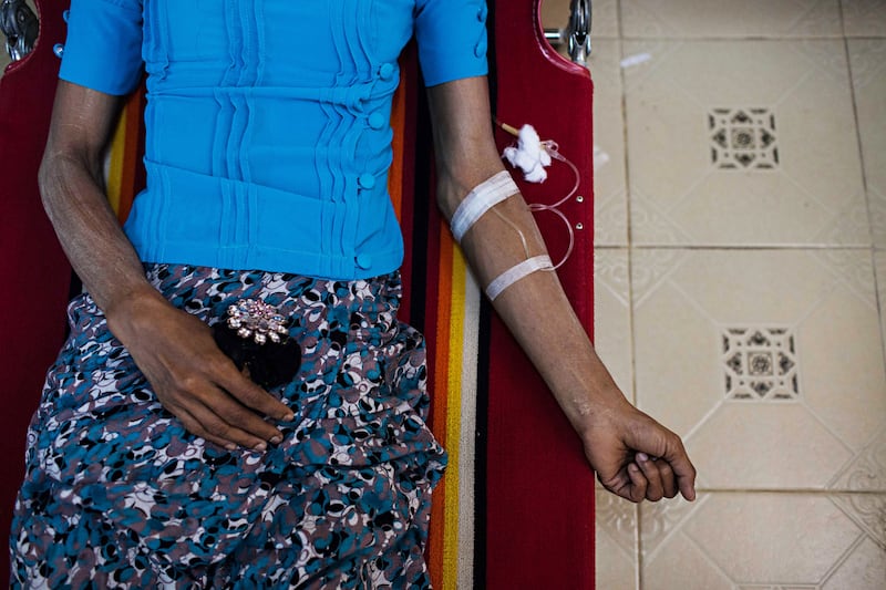 An HIV-infected woman in Yangon, Nov. 29, 2014