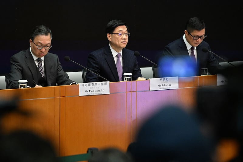 2024年1月30日,香港特首李家超在记者会上宣布,启动《基本法》23条立法谘询。(法新社)
