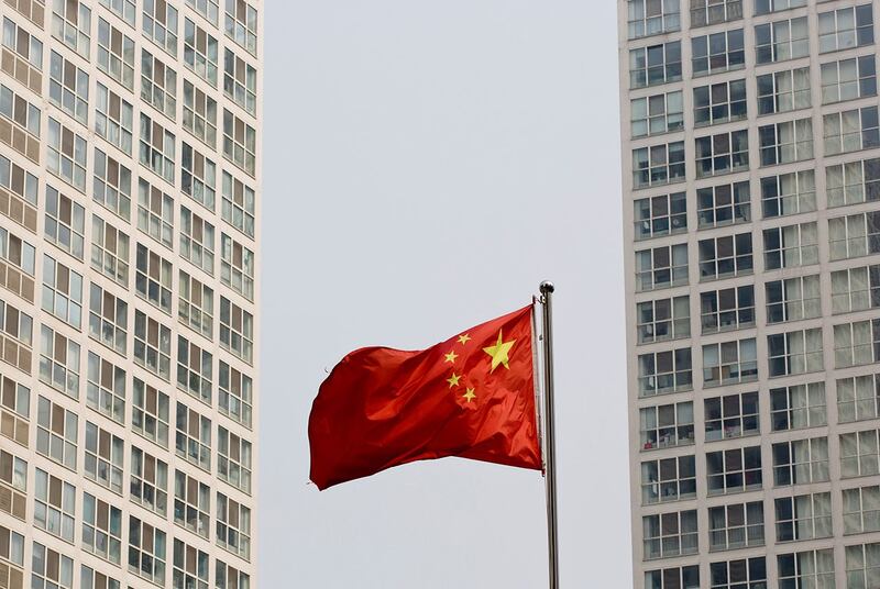 中国审计署发布工作报告,有70个地区以“自卖自买”国有资产、虚构土地交易等方式,虚增财政收入860亿余元。(美联社资料图片)