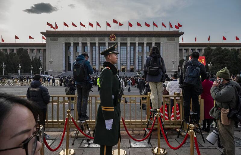 Beijing groans under tight security.png