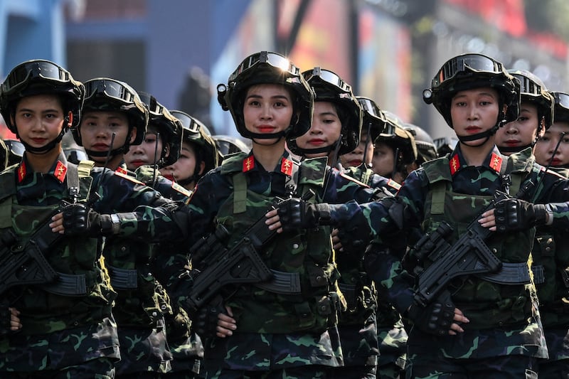 Members of the Vietnamese armed forces march during a parade marking the 50th anniversary of the fall of Saigon and the end of the Vietnam War in Ho Chi Minh City on April 30, 2025.