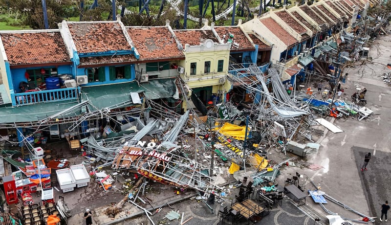 This aerial picture shows damaged buildings and debris on a street after Typhoon Yagi hit Ha Long, in Quang Ninh province, on Sept. 8, 2024. Nhac Nguyen/AFP