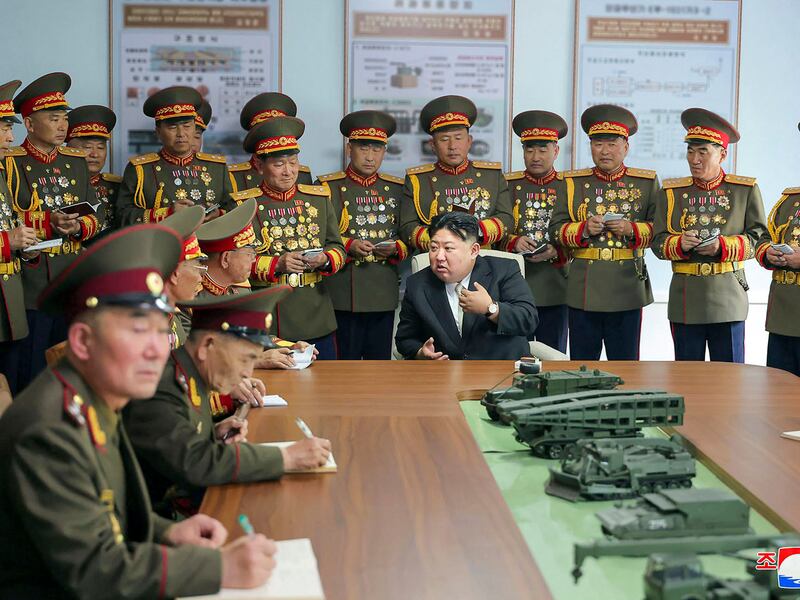 April 26, 2024 North Korea's leader Kim Jong Un (C) visits the Kim Il Sung Military University in Pyongyang, April 26, 2024.