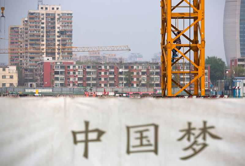 中国媒体第一财经周三发布的社论指,"让民营企业有感有得,将是一把经济重整的钥匙"。(美联社图片)