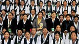 བུད་མེད་ལྷན་ཚོགས་ཀྱི་ཚོགས་ཆེན་ཐེངས་༡༠པ།