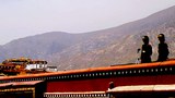 དམག་མིའི་ལྟ་སྲུང་ཡོད་པའི་ལྷ་སའི་གྲོང་མི།