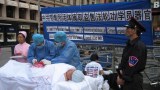 རྒྱ་ནག་གཞུང་ནས་མིའི་ལུས་ཀྱི་ནང་ཁྲོལ་བཏོན་པའི་གནས་ལུགས།
