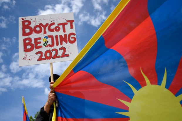 ༢༠༢༢ལོའི་པེ་ཅིང་ཨོ་ལོམ་པིག་རྩེད་འགྲན་སླེབས་ལ་ཉེ་བའི་སྐབས་ཕྱི་ཕྱོགས་ནས་རྒྱ་ནག་ནང་འགྲིམ་འགྲུལ་གྱི་སྒོ་མོ་ཕྱེད་རྒྱུའི་གྲ་སྒྲིག་བྱེད་བཞིན་པ།