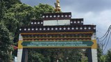 བོད་མིའི་སྒྲིག་འཛུགས་ཀྱི་ལྟེ་གནས་གངས་ཅན་སྐྱིད་གཤོངས་ཀྱི་སྒོ་ཆེན།