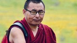 རྩོམ་པ་པོ་རོང་བོ་དགེ་འདུན་ལྷུན་གྲུབ་ལགས་བཙོན་འཇུག་དུས་ཡུན་ཚང་ནས་གློད་གྲོལ་བཏང་ཡོད་འདུག